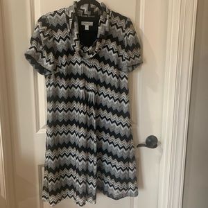 Dress Darn dress. Worn only once. Hits @ 2 inches below the knee. Fully lined.